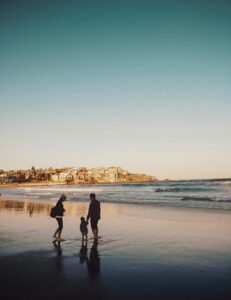 Family at the beach with no financial worry