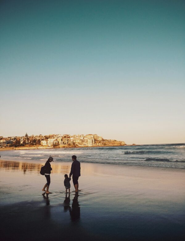 Family at the beach with no financial worry