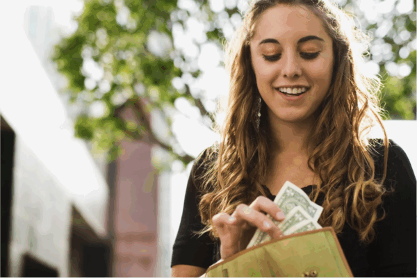 Woman with wallet not spending money